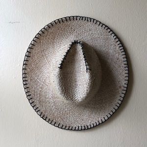 Straw hat with black thread detail